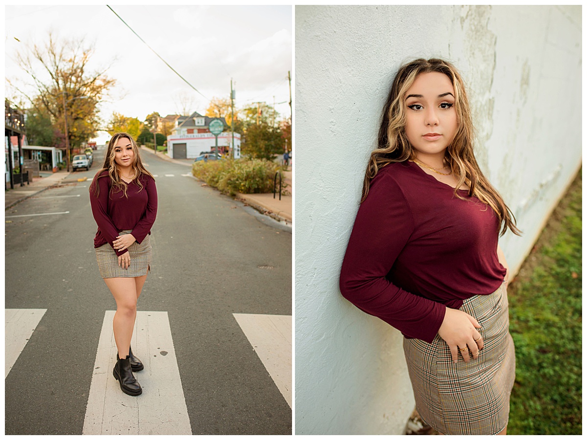 graduating student stands in crosswalk by Charlottesville photographer