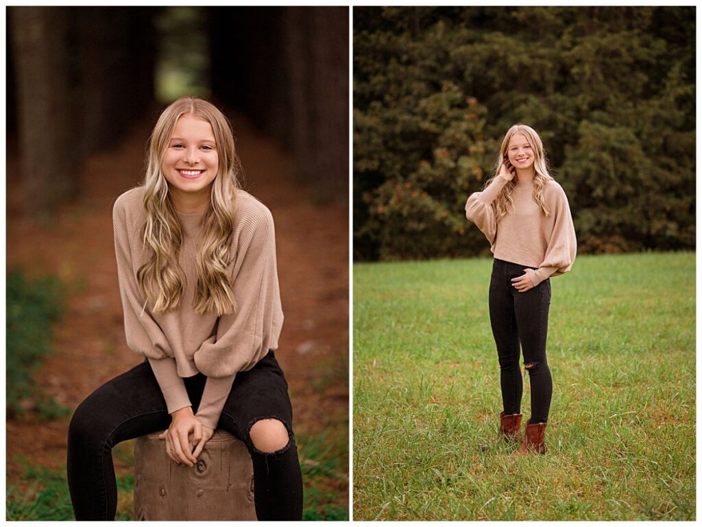 girl sits on stump and smiles during senior session