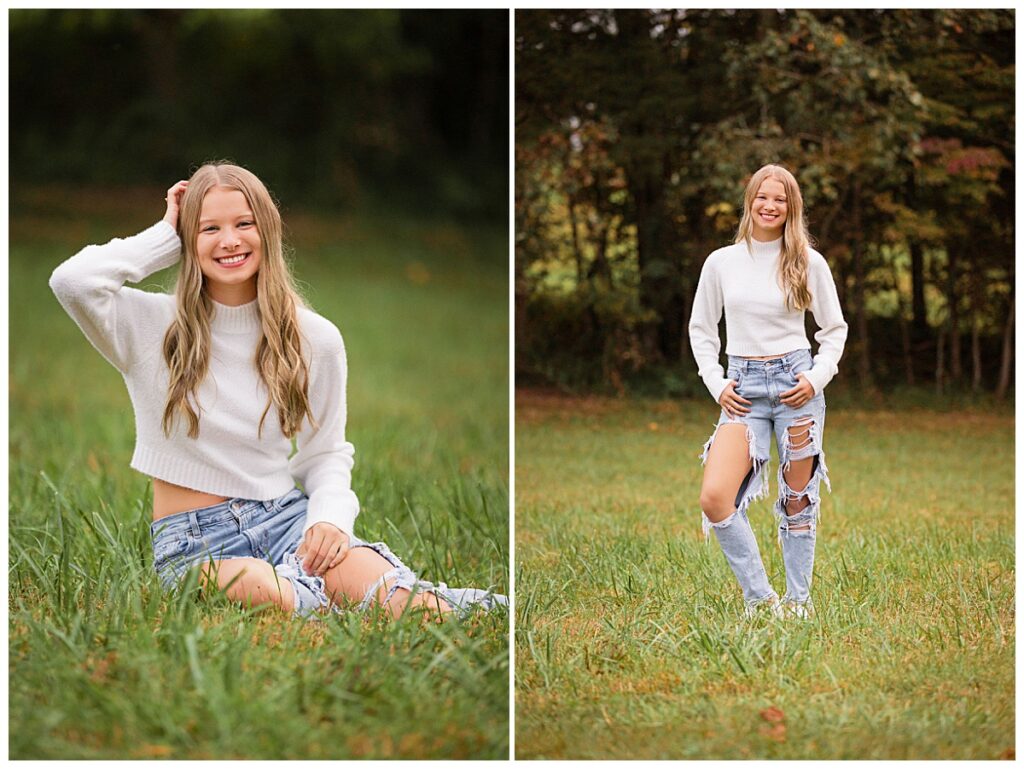 girl wears torn jeans and a white sweater during senior session